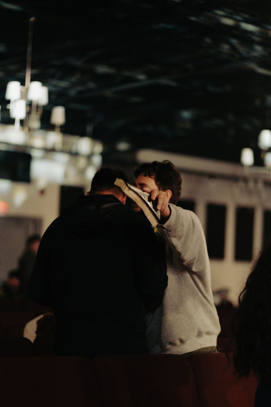 Praying over someone with a Bible