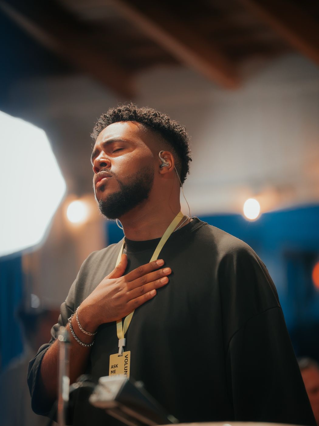 A volunteer worshiping at a prayer room